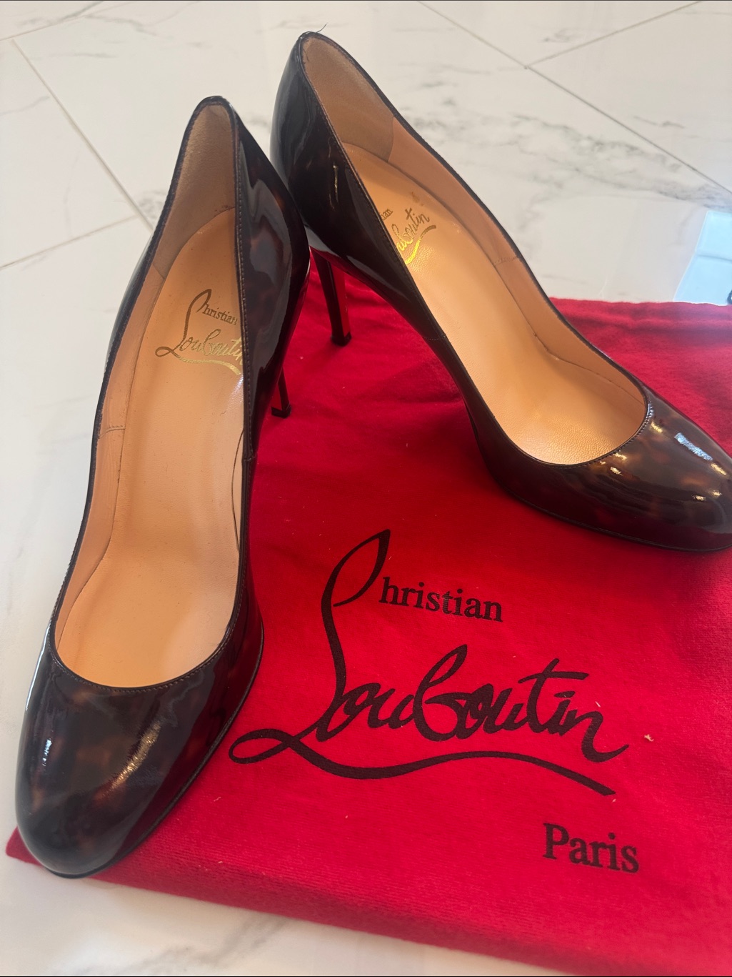Christian Louboutin Tortoiseshell Patent Leather Round Toe Pumps